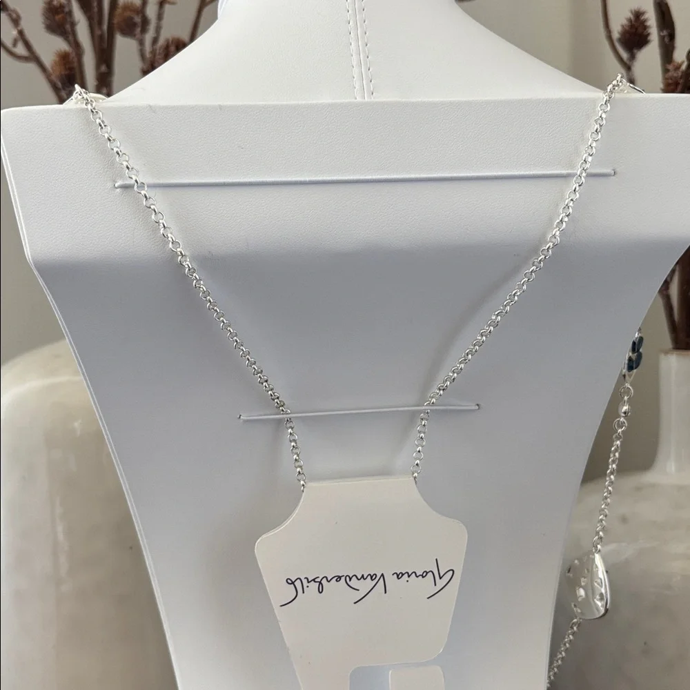 Gloria Vanderbilt Reversible Silvertone chain,teardrop w/blue & clear stones
